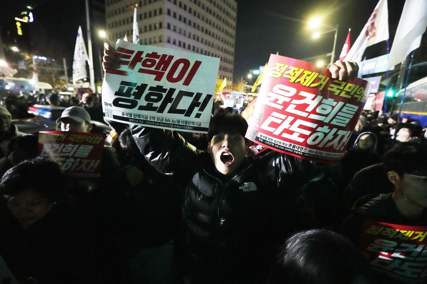 South Korean president says he will lift martial law  AP News