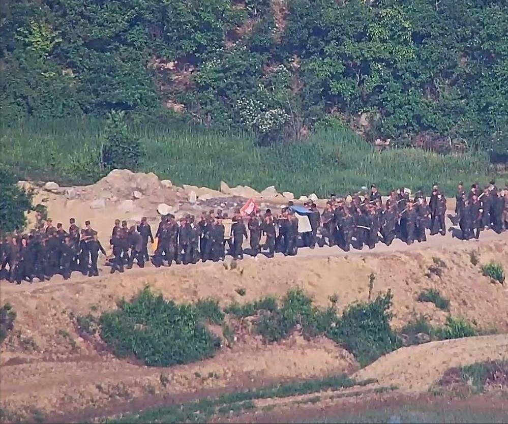 South Korean troops fire warning shots as North Korean soldiers
